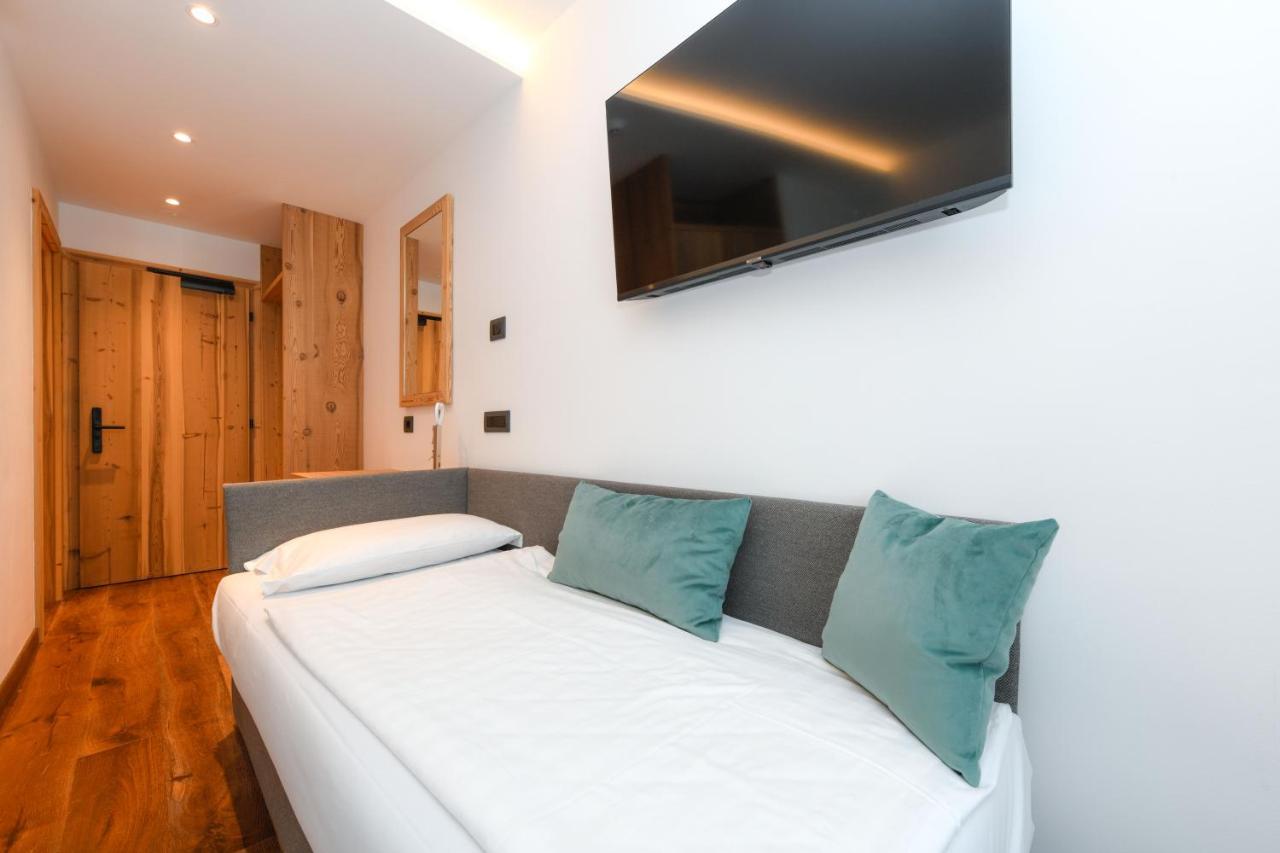 Bepy Hotel Garni Giustino Bagian luar foto
